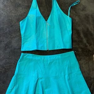 Wilson’s leather, 2 piece leather set. Both sizes large. Green in color